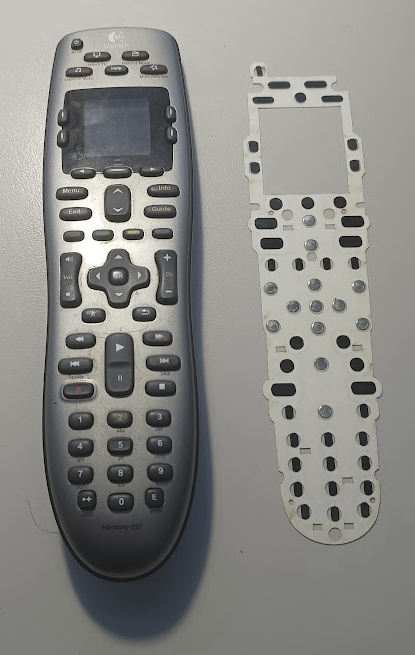 Harmony 650 universal remote control and the replacement keypad membrane to make all the buttons work again