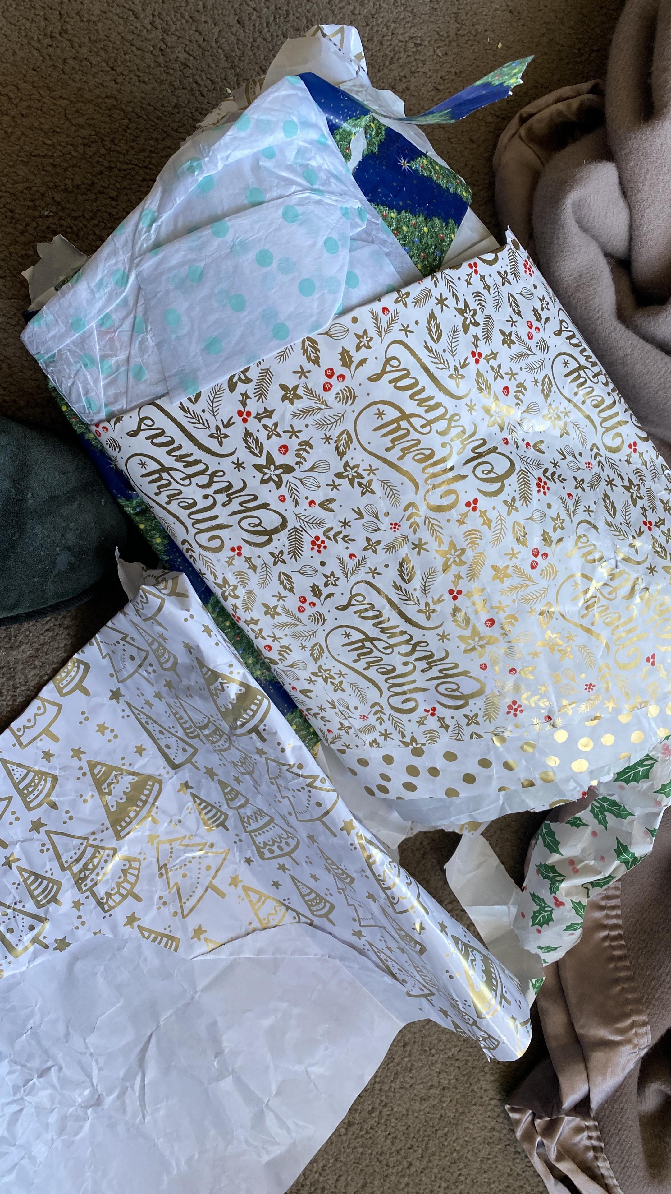 A pile of Christmas wrapping paper