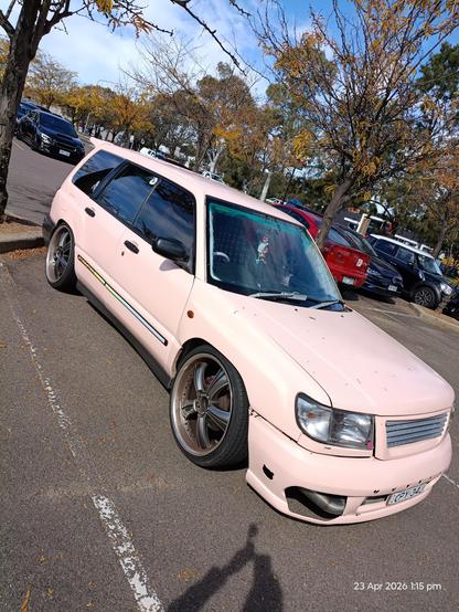 pale pink station wagon