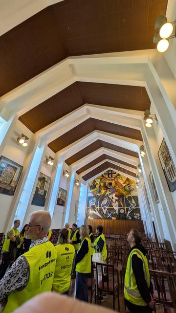 University House's main dining hall with Leanard French's mural "Regeneration" at the far end.