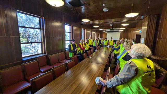 The Scarth Room with all its dark Queensland walnut paneling restored, including removing the white paint on the ceiling panels giving a darker and "more authentically oxbridge" feel to the room.