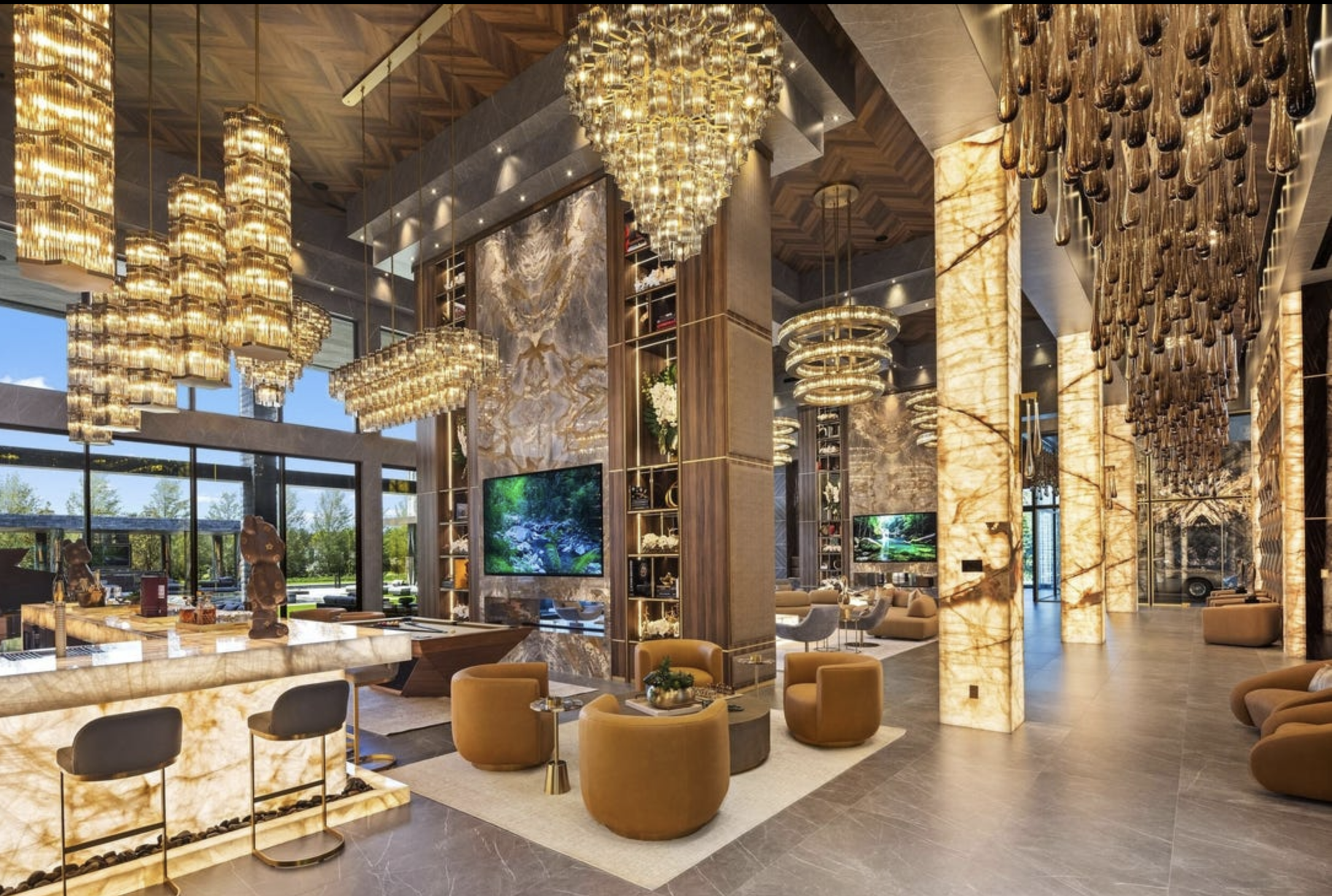 The interior with many, many chandeliers, columns and a bar that are clad in marble and lit up internally somehow