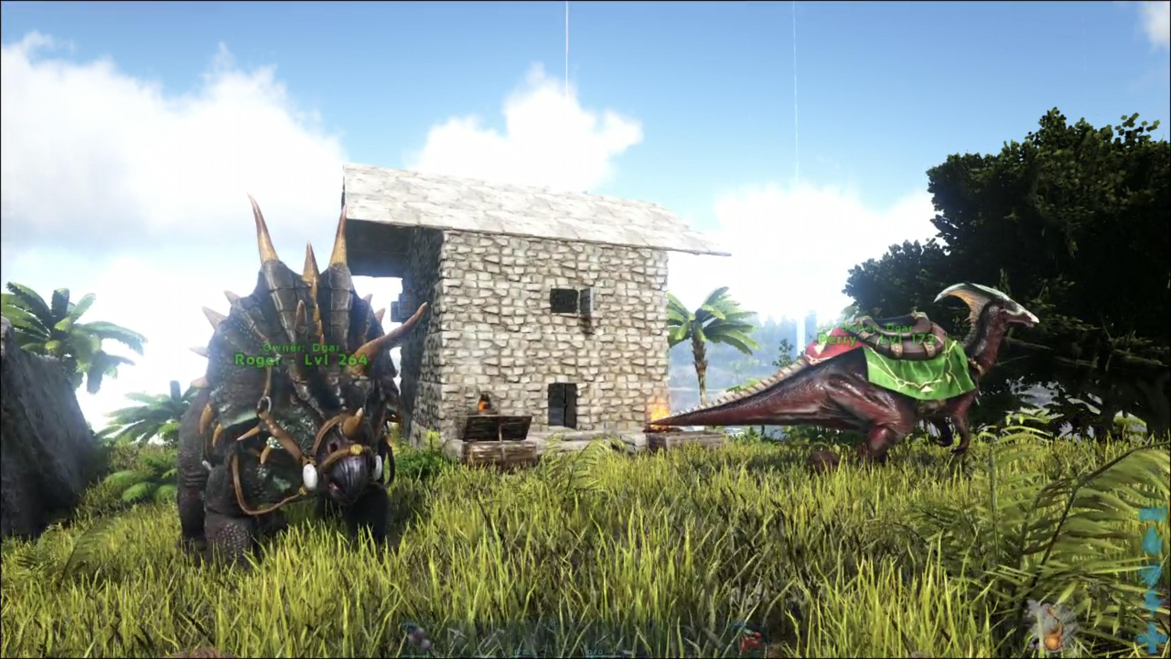 A Triceratops and a Parasaur with saddles stand outside a small stone starter base.  A camp fire is sending a faint column of smoke into the sky.