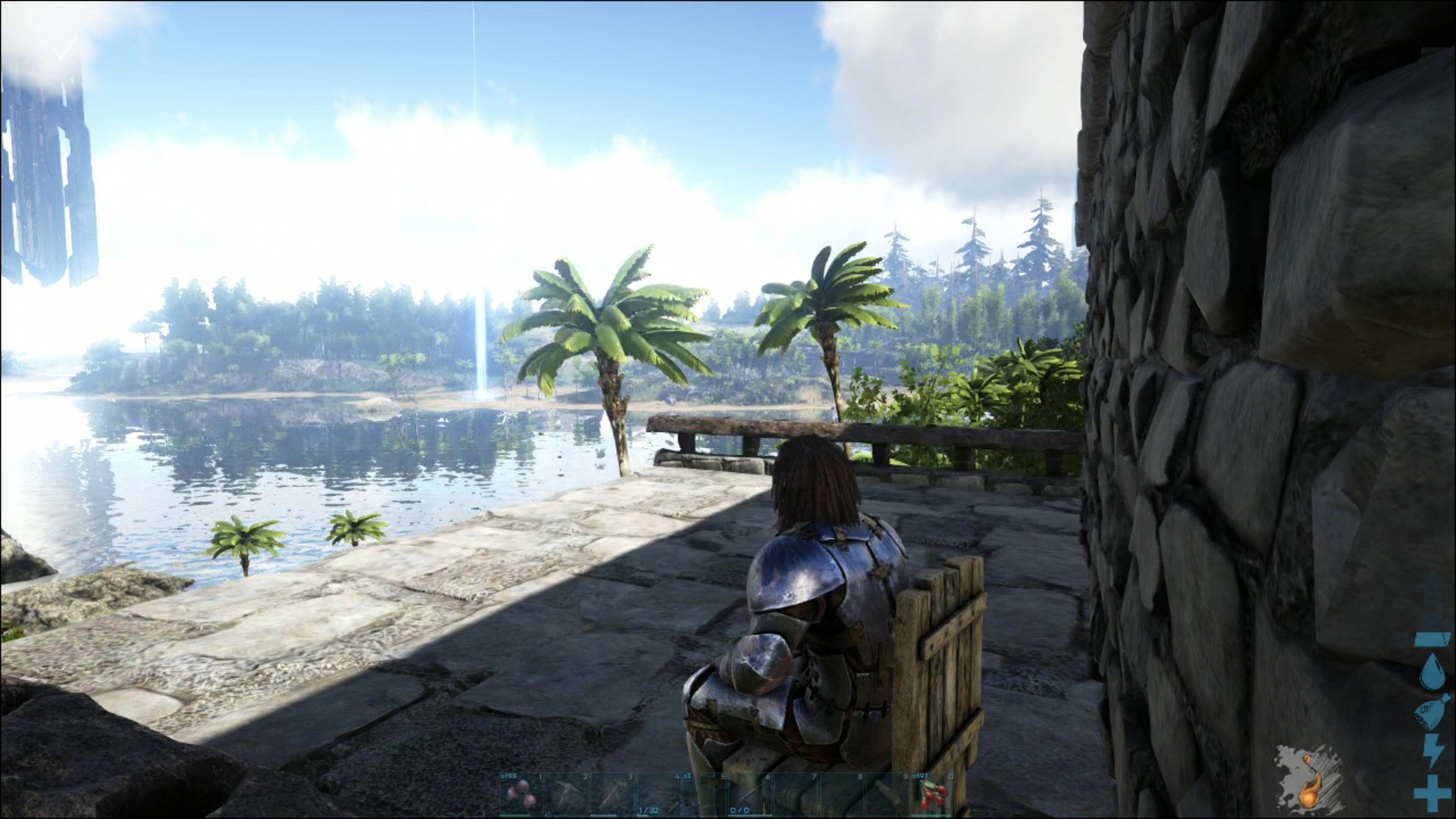 An armour clad figure sits on a wood chair overlooking a calm beach scene.