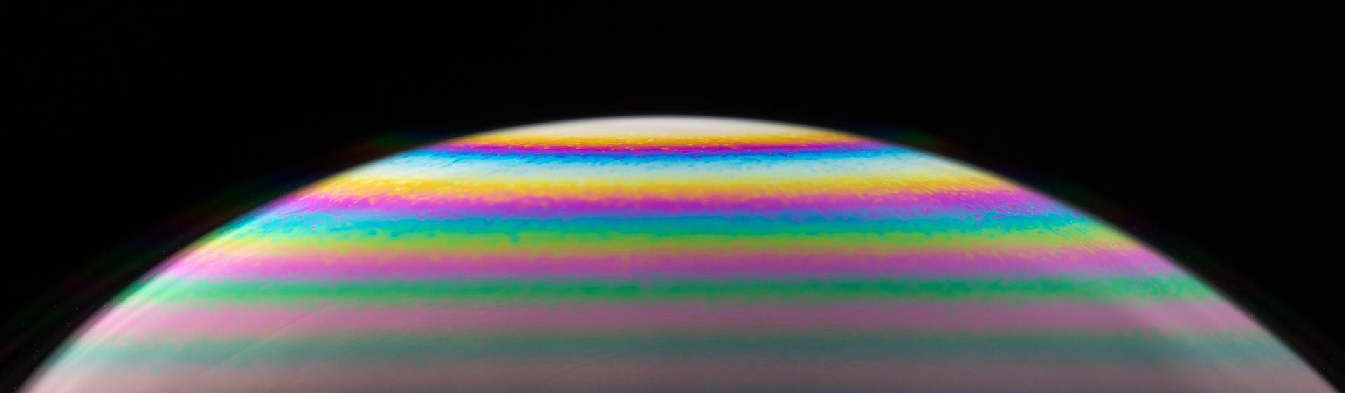 abstract colours on the surface of a soap bubble abstract colours on the surface of a soap bubble